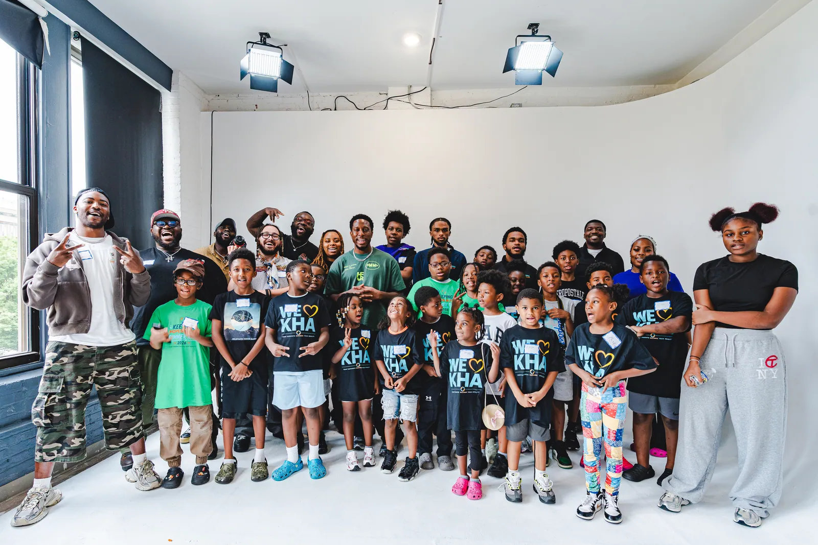 KHA youth and staff together in a photo studio during Summer RISE 2026